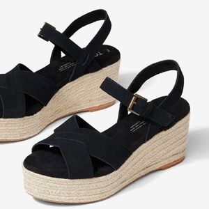 Tom’s women’s black suede platform espadrilles. Size 10. New with tags.